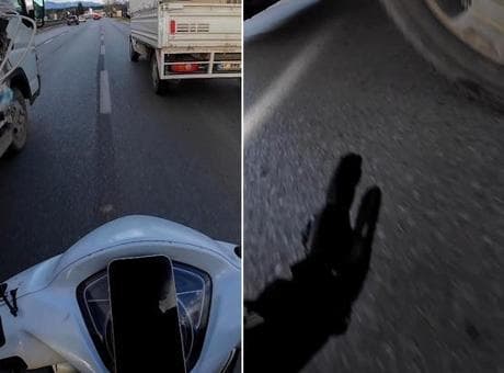 Seyir halinde, kamyonetten sarkan ipe dolanan motosikletli dehşeti yaşadı