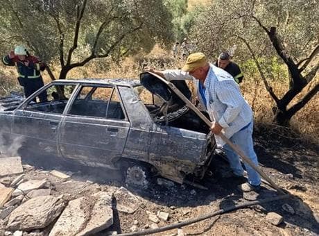 Aracı alev alev yanıyordu! Direksiyona geçti, büyük felaketi son anda önledi