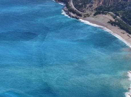 Ölüdeniz’in rengi bir anda turkuaza döndü! Yağış sonrası ortaya çıkan manzara havadan görüntülendi