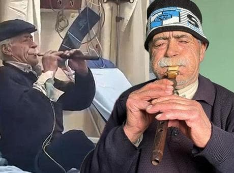 Kolunda serum elinde zurna! Acil serviste ilginç görüntü: 'Acımı hafifletiyor'